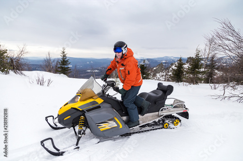 Athlete on a snowmobile