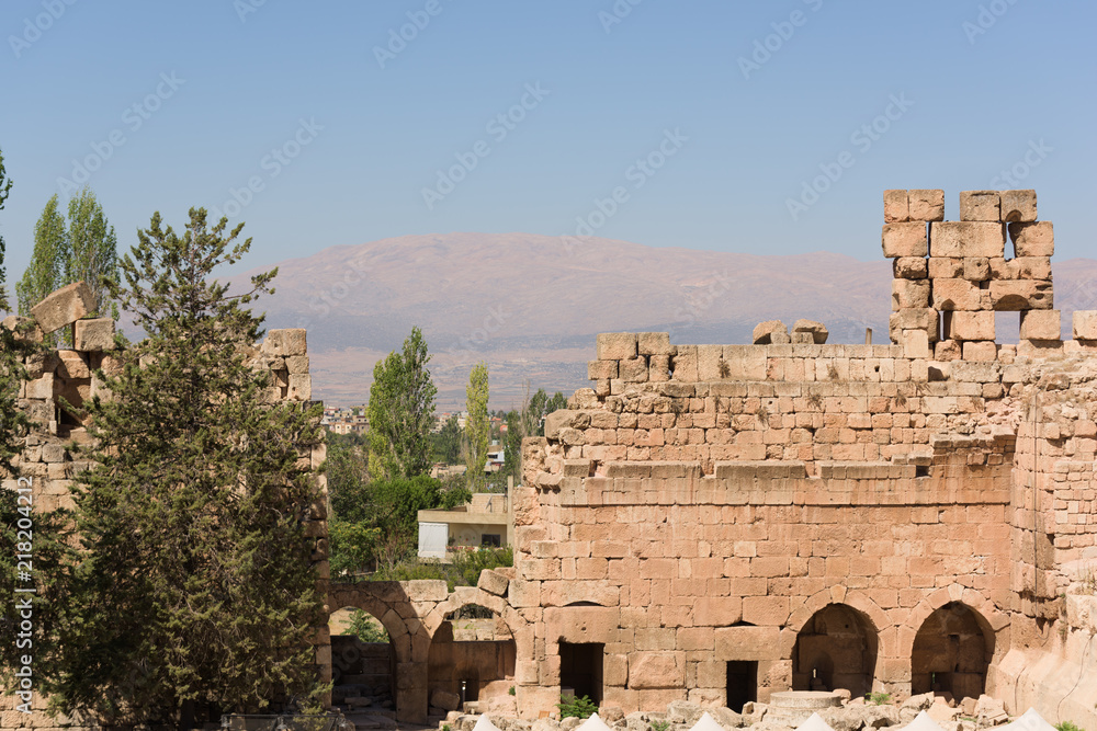 Western stone wall of Jupiter temple and the Bekaa valley landscape in Baalbek, Lebanon.
