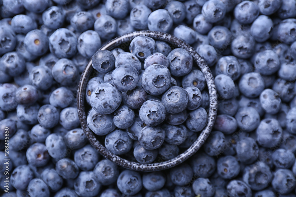 Bowl with fresh ripe blueberries, top view Bowl with fresh ripe blueberries, top view