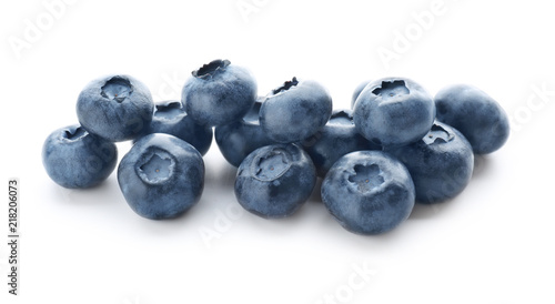 Ripe blueberries on white background