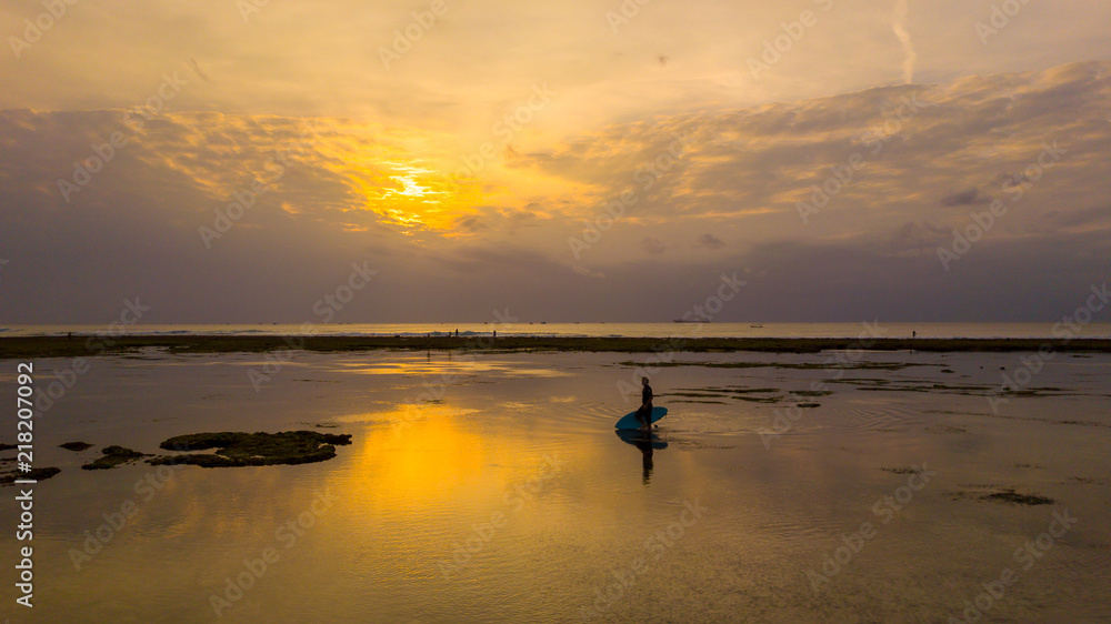 Surfer meets the sunset Surfer meets the sunset
