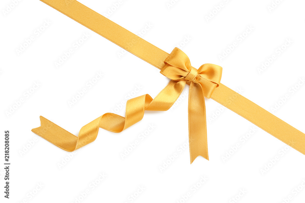Golden ribbon with bow on white background Golden ribbon with bow on white background