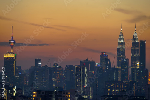 Majestic sunset over Twin Towers and surrounded buildings in downtown Kuala Lumpur  Malaysia. 
