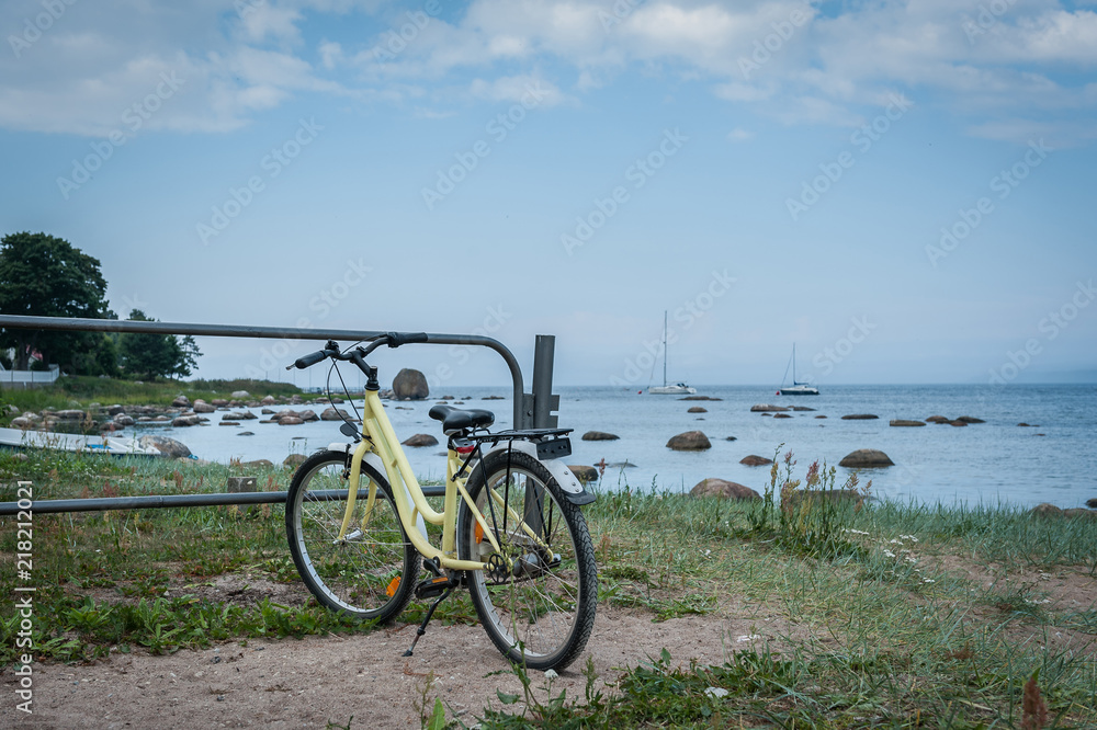 Bicycle parked along the stoned coast of Baltic sea. Kasmu, village of captains, Estonia. Copy space.
