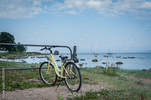 Bicycle parked along the stoned coast of Baltic sea. Kasmu, village of captains, Estonia. Copy space.