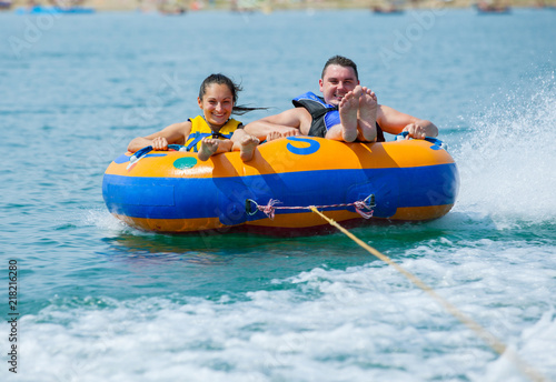 Young couiple on water attractions during summer vacations © Andriy Petrenko