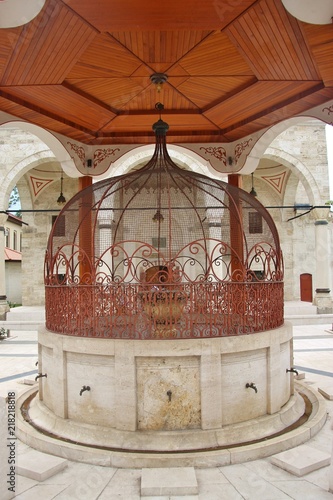 Well building in the yard of the Ferhadija Mosque, built in the 16th century. Banja Luka, Bosnia and Herzegovina, South-east Europe photo