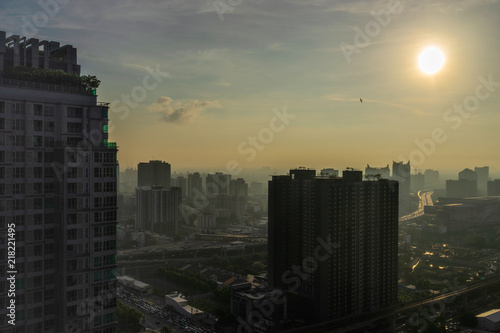silhouette building cityscape on sunset sky © bank215