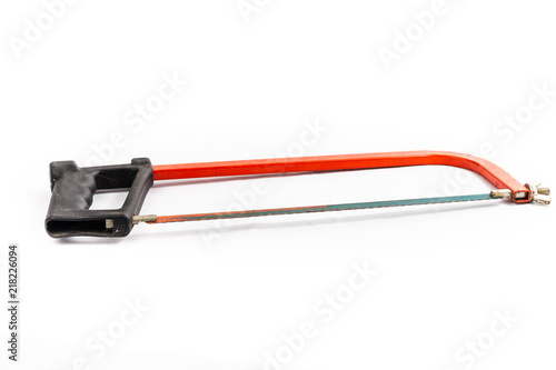 Obraz na płótnie red hacksaw on a white background in studio w salonie