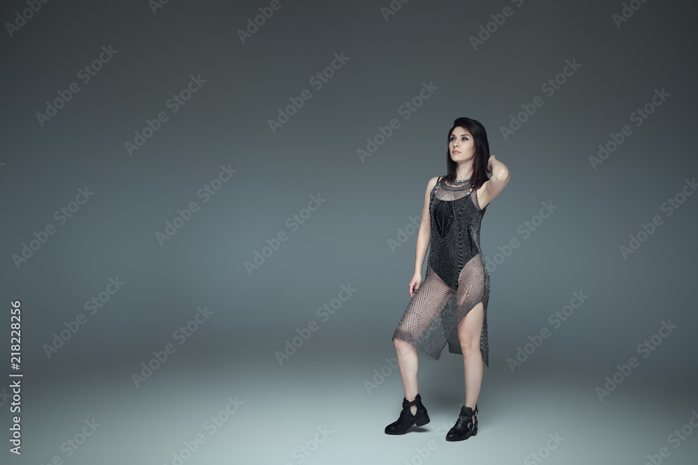 Two fashionable girls wearing black trendy outfits posing Two fashionable girls wearing black trendy outfits posing