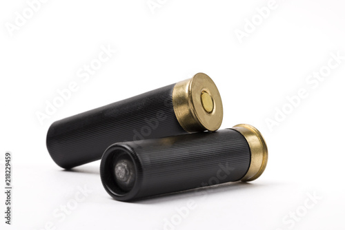 Cartridges from a hunting rifle on an isolated white background. Hunting.