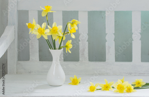 Fototapeta Naklejka Na Ścianę i Meble -  spring yellow flowers in white vase