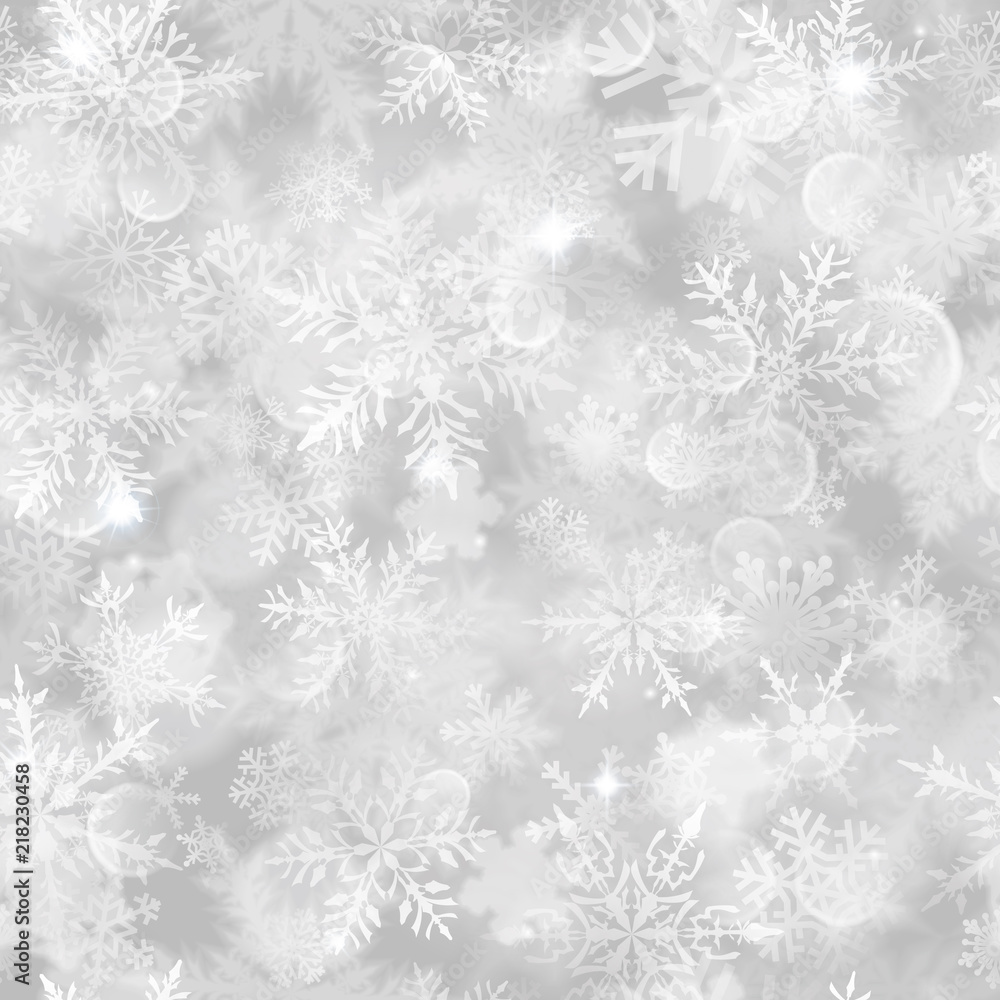 Christmas seamless pattern with white blurred snowflakes, glare and sparkles on gray background Christmas seamless pattern with white blurred snowflakes, glare and sparkles on gray background
