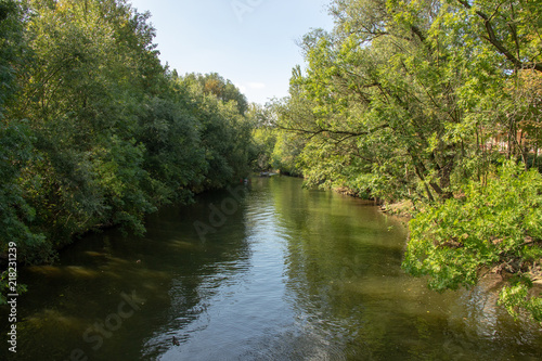 Picture from the river elster in the near from karl heine canal.this is a beautiful way watersports and a. wonderful way for cyclists skateboarders and pedestrians