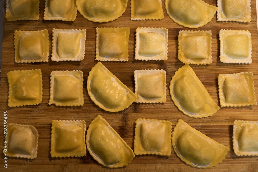 Fresh pasta agnolotti on a table for dry Fresh pasta agnolotti on a table for dry