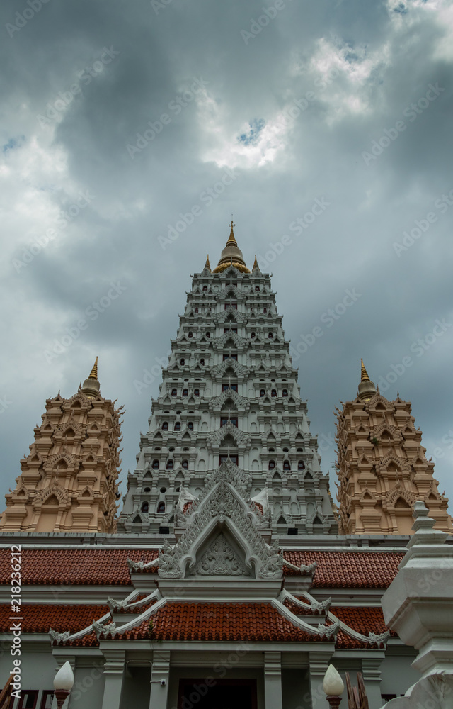 Fototapeta premium The uprisen view angel of Yannasang Wararam temple (Wat Yannasang Wararam) with cloudy sky.