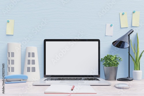 Mockup laptop on desk , back blue wall background,3d rendering