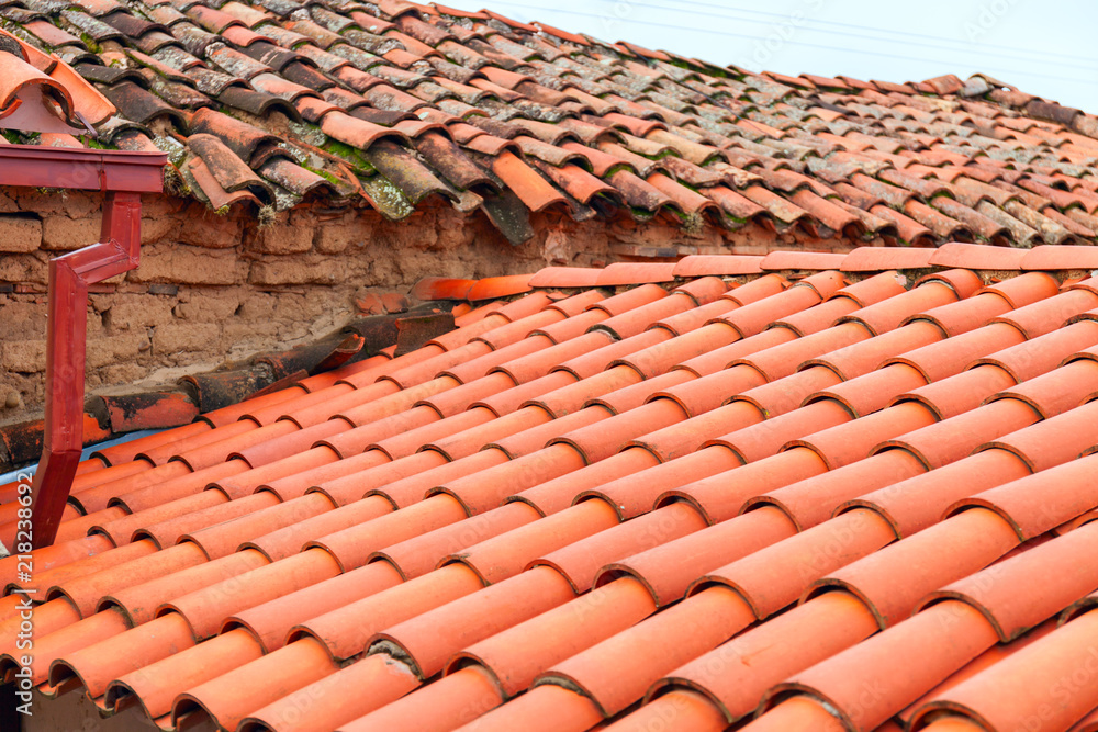 Old red brick roof tiles of Italian houses