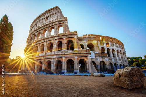 Colosseum in Rome at the Sunrise Time - Colosseum is one of the main travel attractions - The Main symbol of Rome