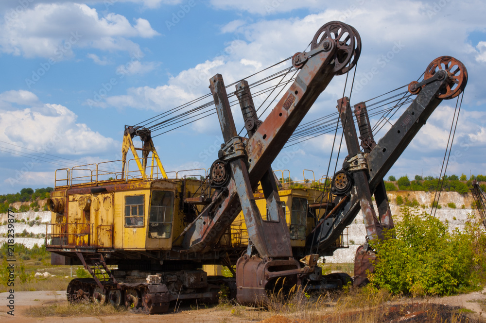 old caterpillar, rusty, abandoned quarry excavators after work old caterpillar, rusty, abandoned quarry excavators after work
