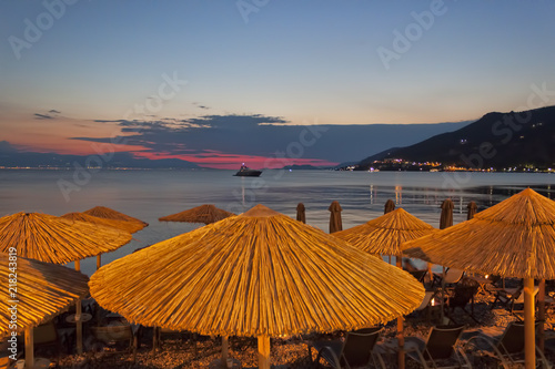Sunset and evening lights on the coast of Loutraki