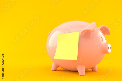 Piggy bank with blank yellow sticker
