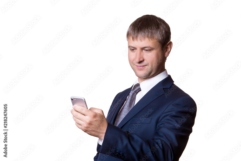 Portrait of a happy businessman in eyeglasses using smartphone over white background. Portrait of a happy businessman in eyeglasses using smartphone over white background.