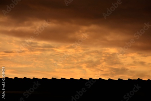 silhouette of roof at evening