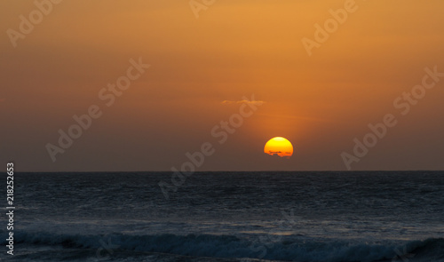 Amazing Sunset at Jericoacoara Beach. The sun in all its glory, with the perfect stage.