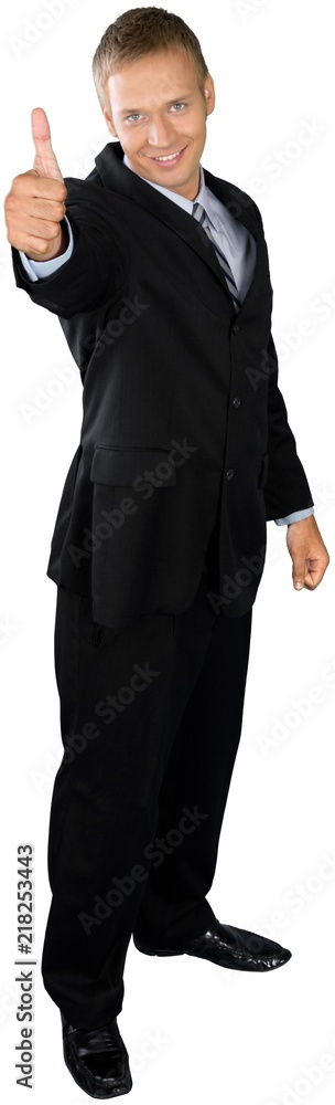 Professional looking man in a suit and tie giving a thumbs up Professional looking man in a suit and tie giving a thumbs up