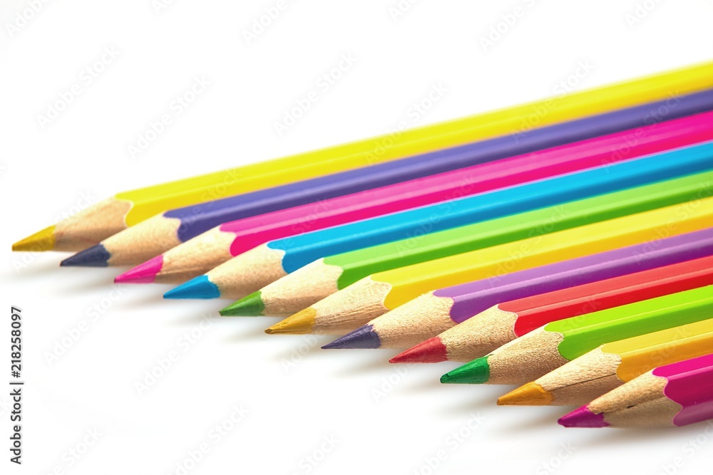 concept-colored pencils laid out on a dark background concept-colored pencils laid out on a dark background