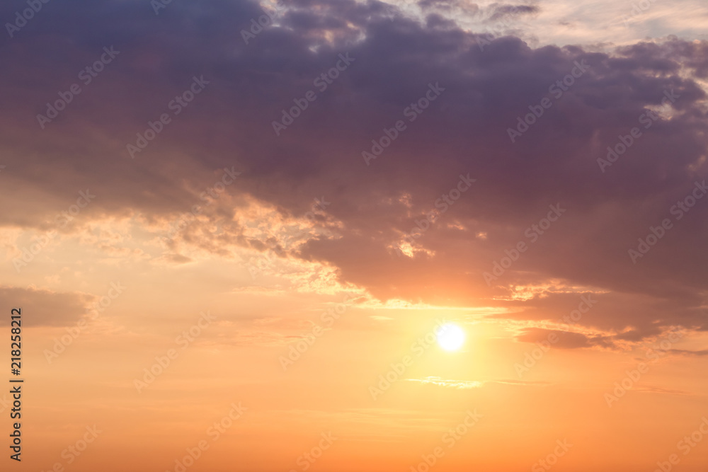 The sun looks like because of clouds in the evening. The sky at sunset. Template for design_