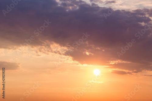 The sun looks like because of clouds in the evening. The sky at sunset. Template for design_ © Volodymyr