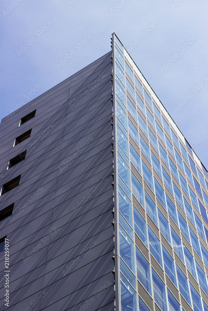 Facade of a modern apartment building. Blue Sky. Facade of a modern apartment building. Blue Sky.