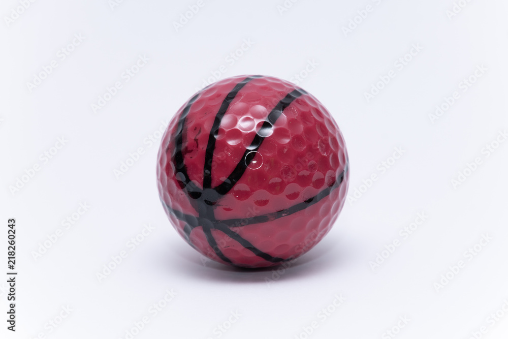 Golfball painted like a basketball ball golf ball Golfball painted like a basketball ball golf ball