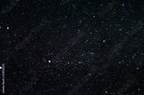 Long exposure night photo. A lot of stars with constellations. Far from the city. Night wonderful landscape.