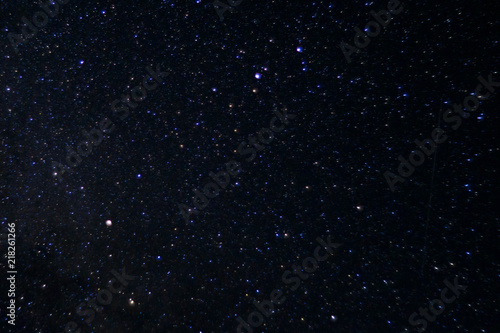 Long exposure night photo. A lot of stars with constellations. Far from the city. Night landscape.