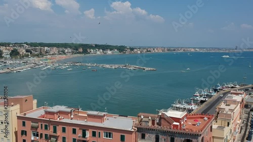 Revealing shot over Italian beach photo