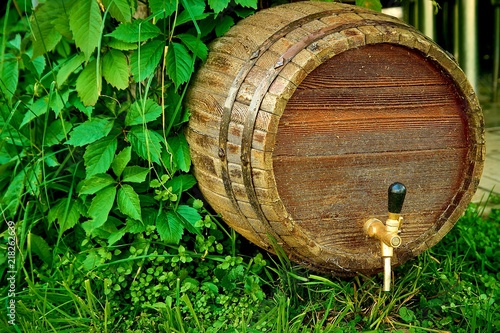 Wooden barrel of wine on the street near the vineyard