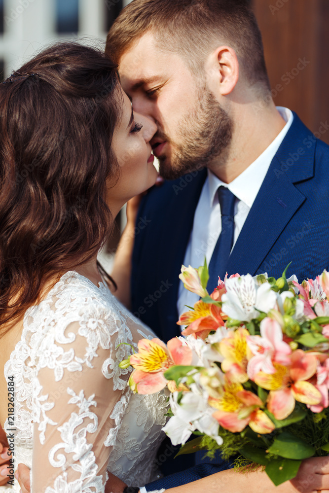 Beautiful Bride and Groom enjoy each other. happy romantic young couple  celebrating their marriage. Sexy kissing stylish couple of lovers close up  portrait. wedding concept. Stock Photo | Adobe Stock