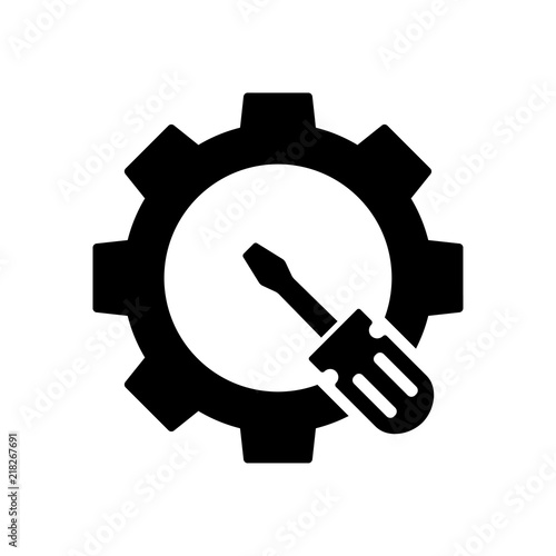 Icono plano engranaje con destornillador ladeado en color negro