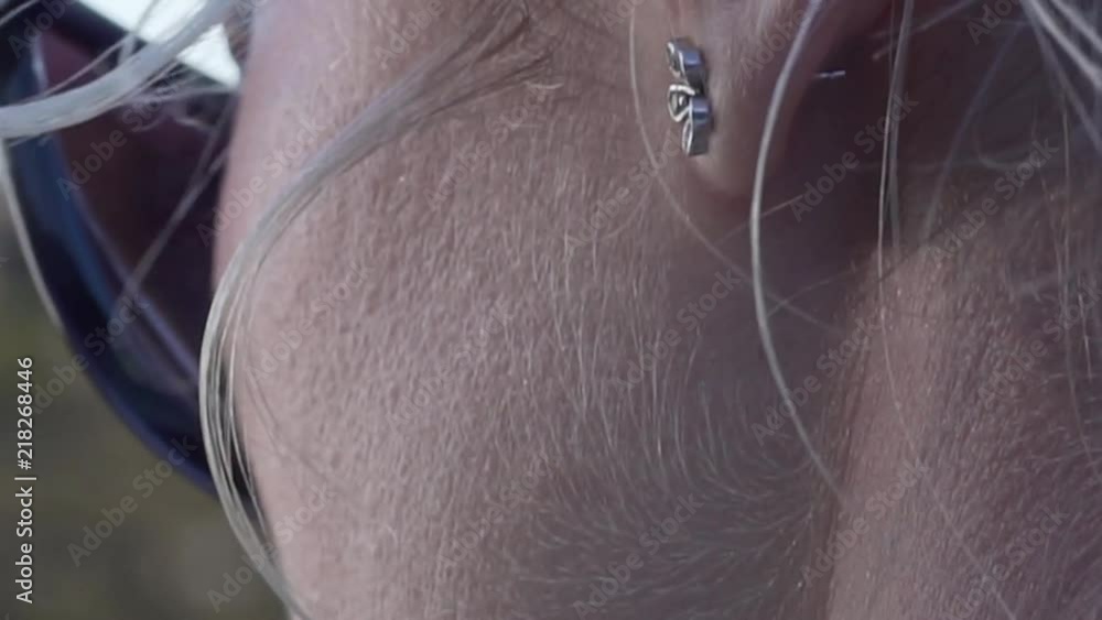 Close shot of a Blonde Girl Face with details of the Skin and Hair Close shot of a Blonde Girl Face with details of the Skin and Hair