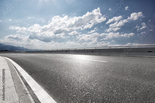Wallpaper Mural highway through mountain with blue sky Torontodigital.ca
