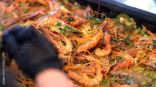 Wallpaper Mural Cooking seasoned shrimp for chipotle shrimp tacos. Shrimp with parsley and lime in a frying pan cook mixes, closeup Torontodigital.ca