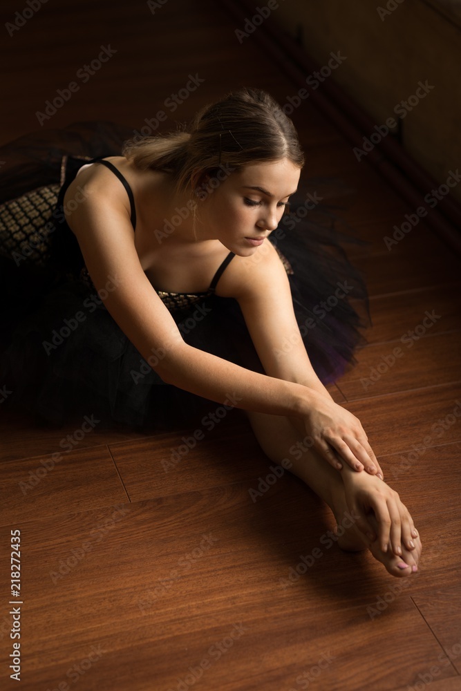 Ballerina practicing ballet dance in studio Ballerina practicing ballet dance in studio