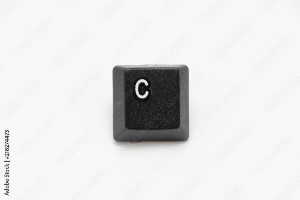 Single black keys of keyboard with different letters C Single black keys of keyboard with different letters C