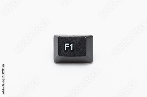 Single black keys of keyboard with different letters F1