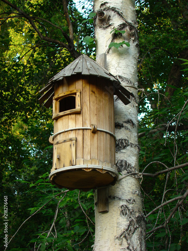 wooden birdhouse on the tree