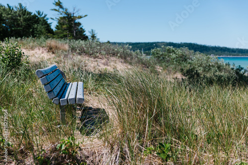 Wooden bench on the dunes of Lake Michigan