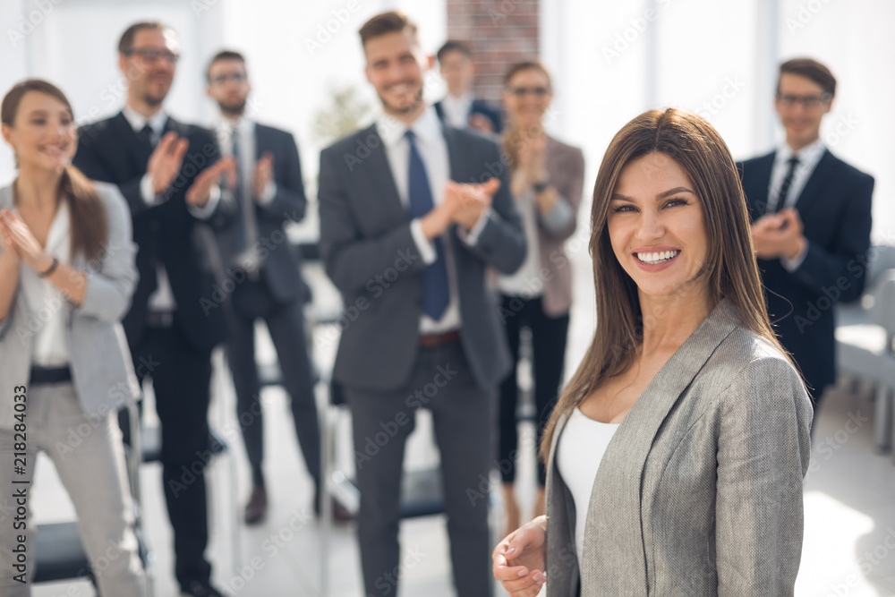 successful business woman standing in conference room successful business woman standing in conference room